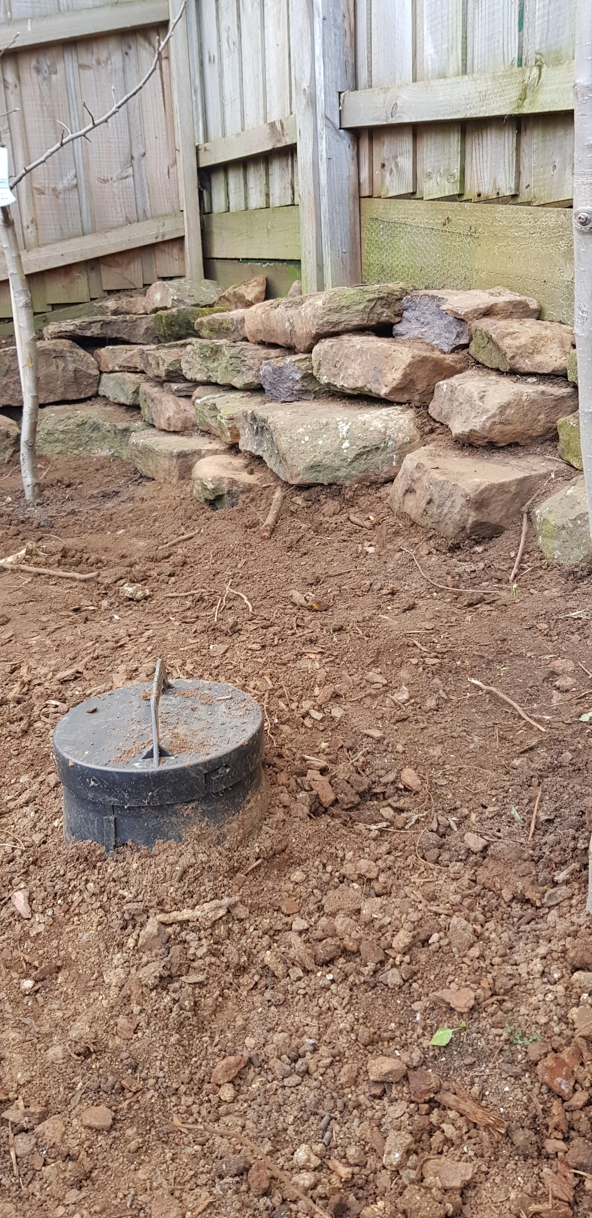 Corner sleeper garden bed before