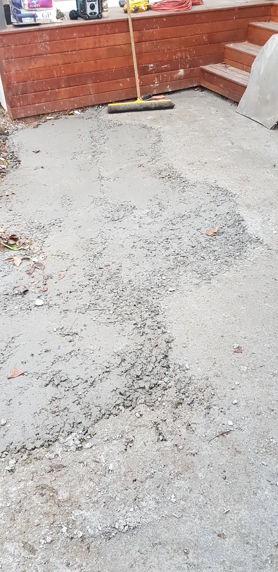 Compacted crushed rock base formed ready for a concrete driveway pour.